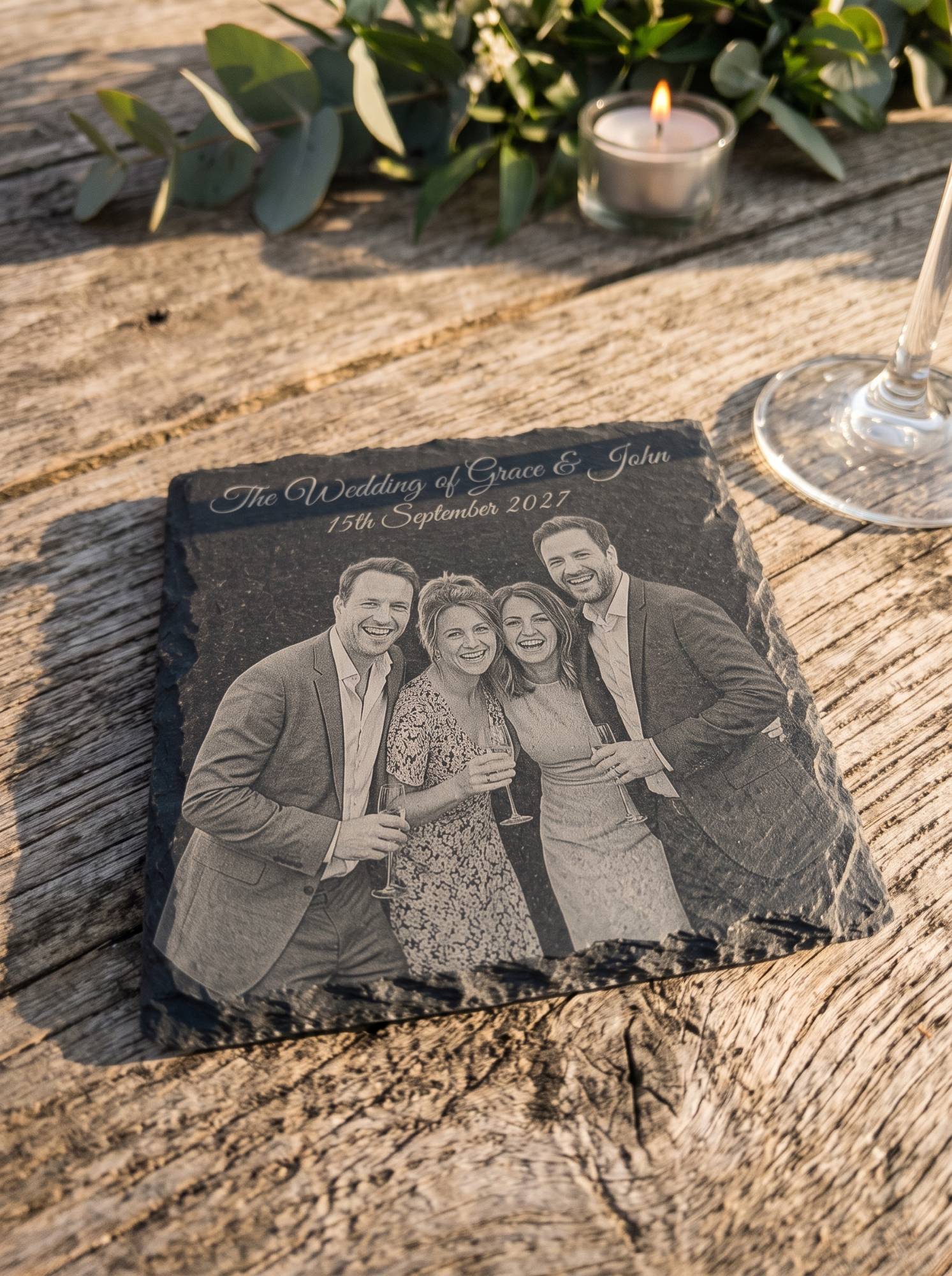 The guests' photo engraved onto a slate coaster